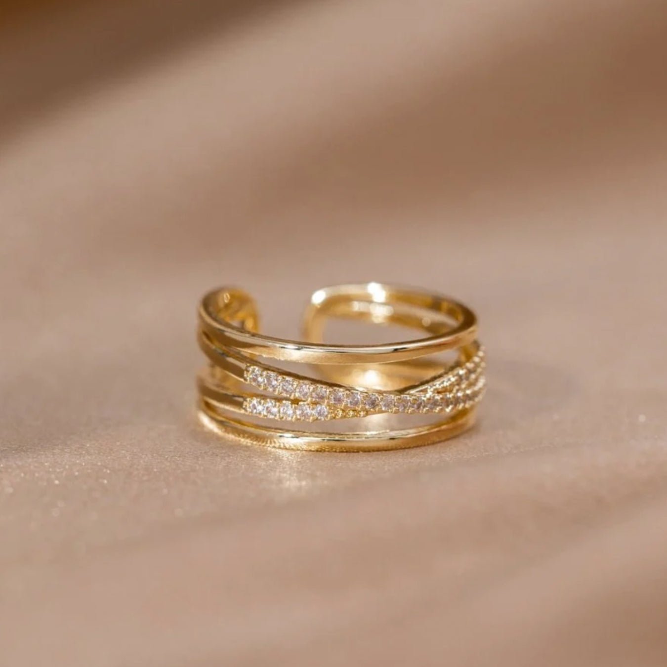 Anillo dorado ajustable de cruz con circonita - Hipnotelia