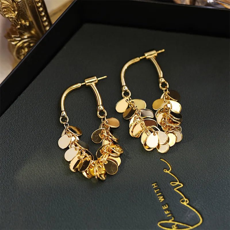 Aretes de lentejuelas doradas - Hipnotelia