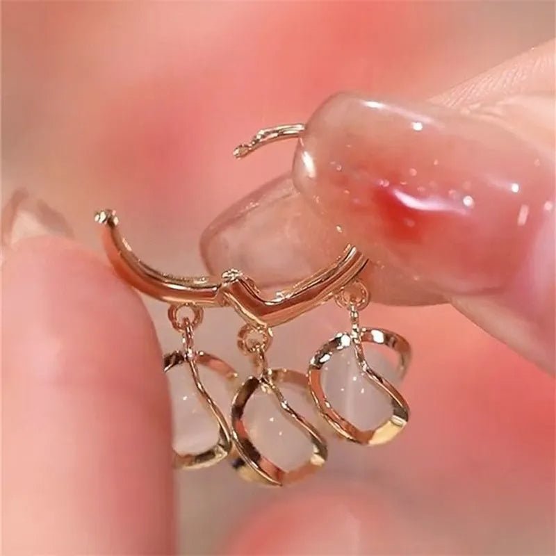 Aretes de ojo de gato - Hipnotelia