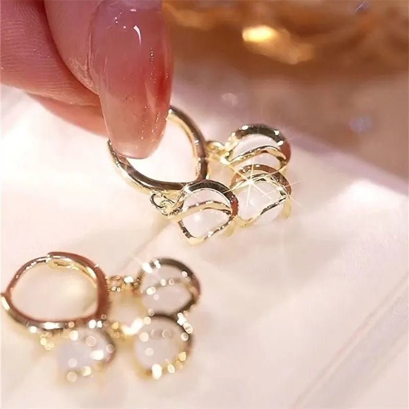 Aretes de ojo de gato - Hipnotelia