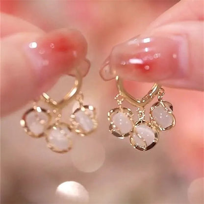 Aretes de ojo de gato - Hipnotelia