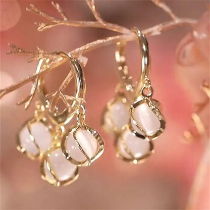 Aretes de ojo de gato - Hipnotelia