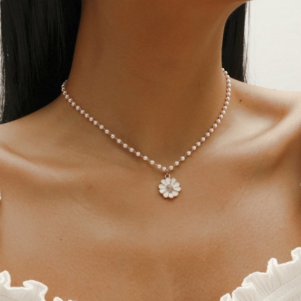 Colgante de margarita con perlas - Hipnotelia