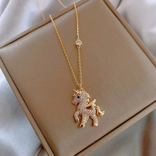Colgante dorado de unicornio con circonita - Hipnotelia