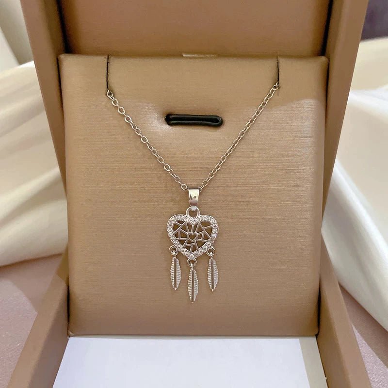 Colgante dorado y plateado de atrapasueño de corazón con circonita - Hipnotelia
