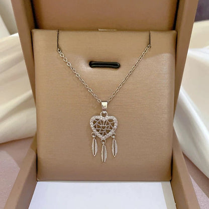 Colgante dorado y plateado de atrapasueño de corazón con circonita - Hipnotelia