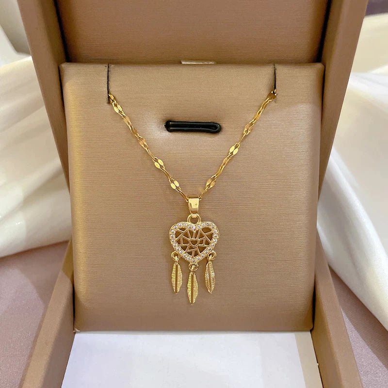 Colgante dorado y plateado de atrapasueño de corazón con circonita - Hipnotelia