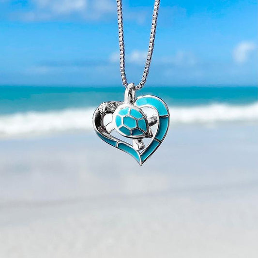 Collar plateado de corazón con tortuga azul - Hipnotelia