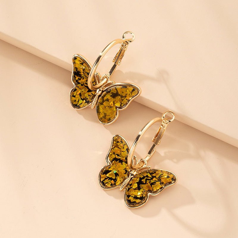 Pendientes dorados acrílicos de mariposa - Hipnotelia