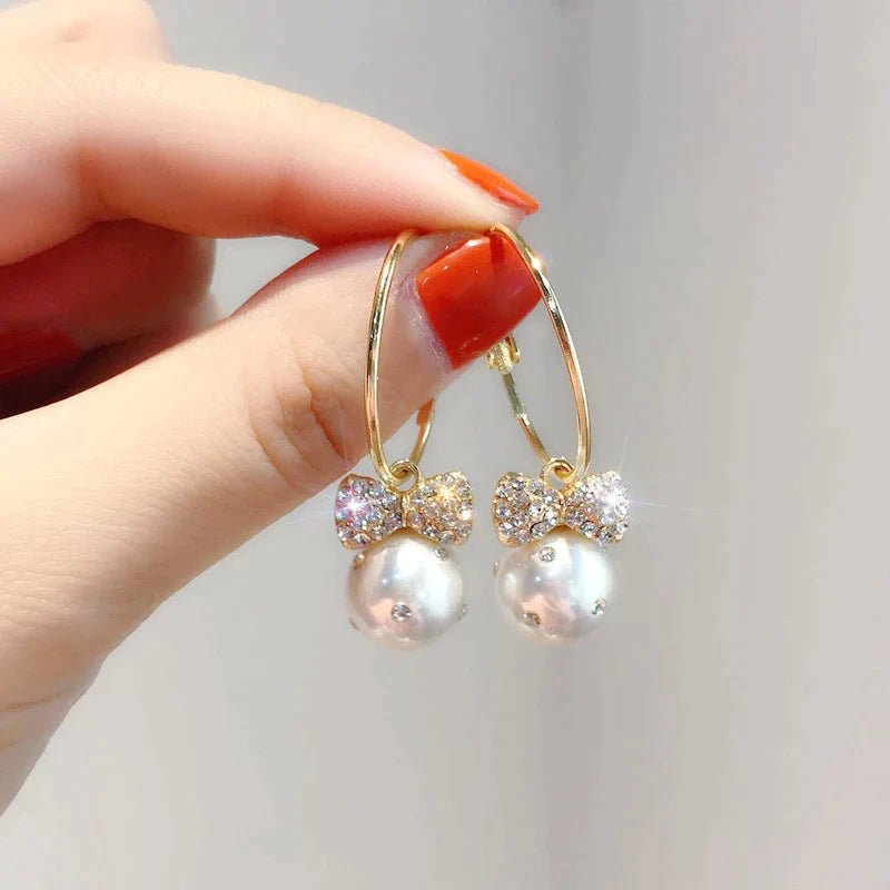 Pendientes dorados brillantes con perlas - Hipnotelia