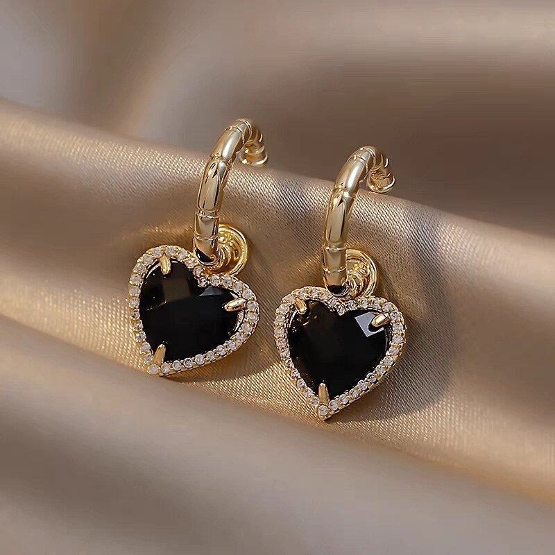 Pendientes dorados de corazón negro - Hipnotelia