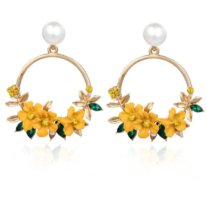 Pendientes dorados de flores y perlas - Hipnotelia