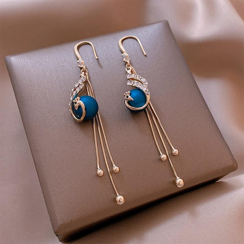 Pendientes festivos con perlas azules - Hipnotelia