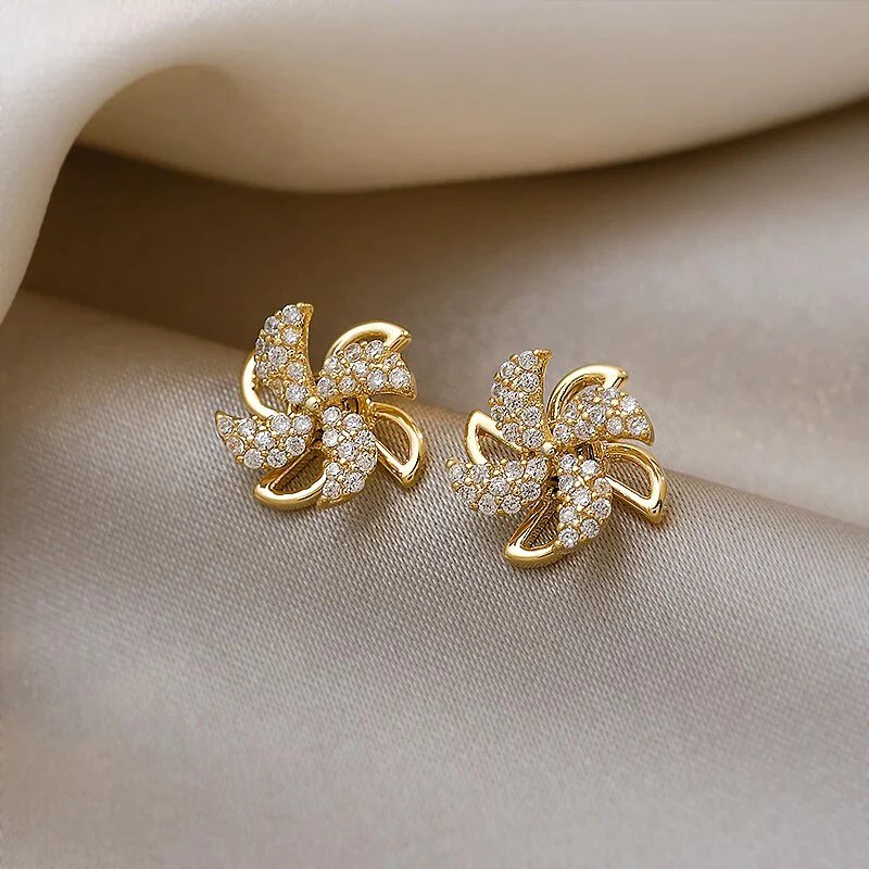 Pendientes molinete dorado con circonita - Hipnotelia