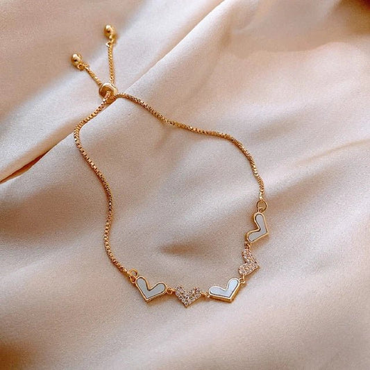 Pulsera ajustable dorada de corazones - Hipnotelia