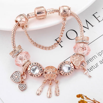 Pulsera rosada de atrapasueños con dijes incluidos - Hipnotelia
