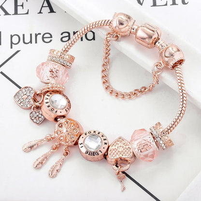 Pulsera rosada de atrapasueños con dijes incluidos - Hipnotelia