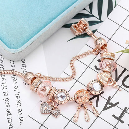 Pulsera rosada de atrapasueños con dijes incluidos - Hipnotelia